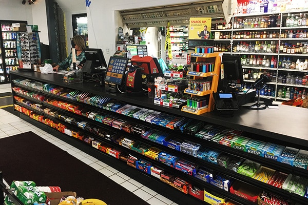 DisplayMax team designed and installed candy front sales counter showcasing custom retail fixture design.