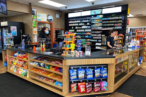 DisplayMax team designed and installed front sales counter showcasing custom retail fixture design.