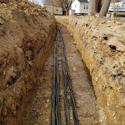 DisplayMax underground electrical conduit installation.