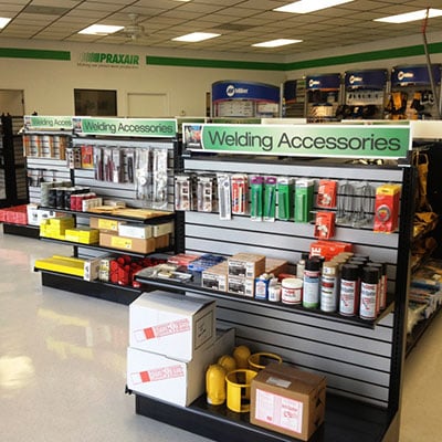 DisplayMax-designed retail layout showcasing welding and MIG accessories on custom store fixtures.
