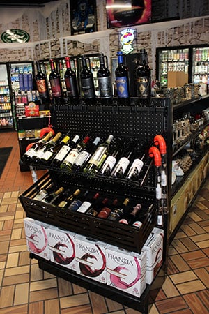 DisplayMax- Retail Wine Display holder cradle crate designed and installed by DisplayMax team.