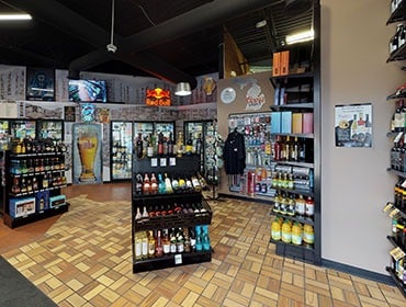 Liquor Store Setup- A retail display of Lozier Gondolas, designed and installed by DisplayMax team